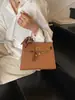 Bolsa Nueva Estilo 2025 Senmeng Texturizada Patrón Lichi Hombro Cuadrada Pequeña Bolsa de Mujer Verano Portátil Bolso Kelly Bolso Mensajero