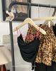 Moda Spice Girl Cruz Espalda Hueca Descubierta Sexy Tirantes Chaleco Casual con Almohadilla en el Pecho Hermoso Envoltorio de Espalda Top Corto