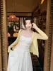 Cubierta de Punto Blanco para Protección Solar 2026 Nuevo Estilo de Verano Vestido Camisola Ropa Exterior Cárdigan Delgado de Seda de Hielo para Mujer