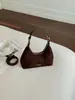 Bolso de mano pequeño elegante de alto valor para comercio exterior para mujer, nueva versión coreana, diseño ins, bolso de media luna, bolso de un solo hombro cruzado, moderno