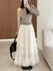 Falda de malla suave estilo pastel A-line abullonada para mujer, otoño 2026, de cintura alta, con caída, holgada, plisada, con dobladillo grande
