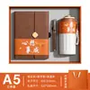 Set de regalo empresarial que incluye un cuaderno, una taza de café y un paraguas, con opción de impresión de logotipo para marca corporativa