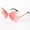 Tendencia europea y americana personalidad divertida fiesta gafas de sol coloridas sin montura recorte forma de mariposa gafas de comercio exterior transfronterizo