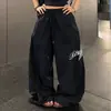 Calças de paraquedista com estampa de leopardo estilo americano e bordado de estrela para mulheres, soltas, casuais, modeladoras, versáteis, de perna larga, corte reto, calças casuais em vermelho