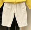 Roupas infantis estilo coreano coleção outono 2026: cardigã de tricô com tranças amarelo bordado e calça casual de perna larga para meninos e meninas