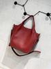 Bolso de piel auténtica para mujer, bolso de mano de piel de vaca de primera capa, moderno bolso de nicho con un solo hombro, bolso grande bajo el brazo, nuevo bolso informal para mujer.