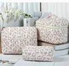 Bolsa de cosméticos portátil gran capacidad floral pequeño almacenamiento portátil algodón acolchado flor linda ins viaje estudiante