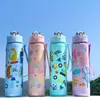 Nuevo vaso de plástico de gran capacidad transfronterizo con lindo patrón de dibujos animados, vaso de agua portátil con asa y pajita, vaso espacial