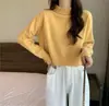Suéter de punto de cuello medio de color liso para mujer, nuevo estilo Otoño e Invierno 2025, suave y ceroso, holgado, simple, camiseta interior de punto, moderno