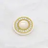Estilo retro de lujo ligero resina metal botón de diamante abrigo de mujer abrigo de punto con botones redondos de diamantes de imitación decorativos