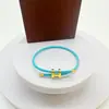 Fivela em Forma de I Dourada Rígida 3D Galvanizada a Cobre com Corda de Aço Pulseira de Mão Ajustável à Prova d'Água e Suor Pronta para Venda