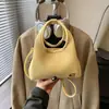 2026 Início da Primavera Novo Estilo Bolsa de Mão Ombro Transversal Saco Saco de Balde Bolsa de Mão Ombro de Nicho Retrô