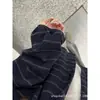 Chaqueta Rayada Castaño Melanoidio para Mujer Otoño Nuevo Estilo Coreano Suelta Perezosa Botón Cárdigan de Punto de Manga Larga