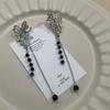 Lujo ligero elegante pedrería hueco mariposa cristal cadena borla clip para hueso de la oreja sin perforación femenino dulce cool aretes de alta gama