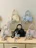 Bolso pequeño de estilo fresco transfronterizo para mujer, nuevo modelo 2026, bolso de hombro y cruzado para el trabajo, bolso tipo bowling moderno y a la moda para mujer