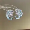 Pendientes vintage estilo corte con borla larga de cuentas en forma de abanico y flor de gota de agua con pedrería brillante, que ofrecen una sensación de lujo ligero y alta gama.