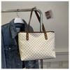 Bolso de gran capacidad de alta gama 2024, nuevo bolso de nicho versátil, bolso de moda para mujer, bolso de mano portátil para mujer.