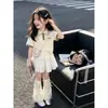 Conjunto de Saia e Camisa Polo para Crianças Grandes Chegada Nova de Verão Estilo Escolar Camiseta de Manga Curta Saia Meia Doce com Laço Conjunto de Duas Peças