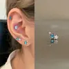 Aretes Brillantes de Zircón Estrella Azul Aretes Frescos de Primavera y Verano Aretes de Acero de Titanio de Fondo Plano para Mujer Aretes Versátiles Venta al por Mayor