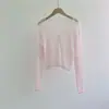 Nuevo estilo Hong Kong de verano retro cuello en V oreja de madera hebilla de perla perezosa lino rústico cárdigan camisa protectora solar camisa de aire acondicionado para mujer