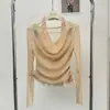 Colección de otoño para mujer Ruoxin Guangzhou: un estilo de dos piezas puro y seductor de top halter de encaje con un acabado nacarado, diseñado para ser una prenda ajustada y favorecedora
