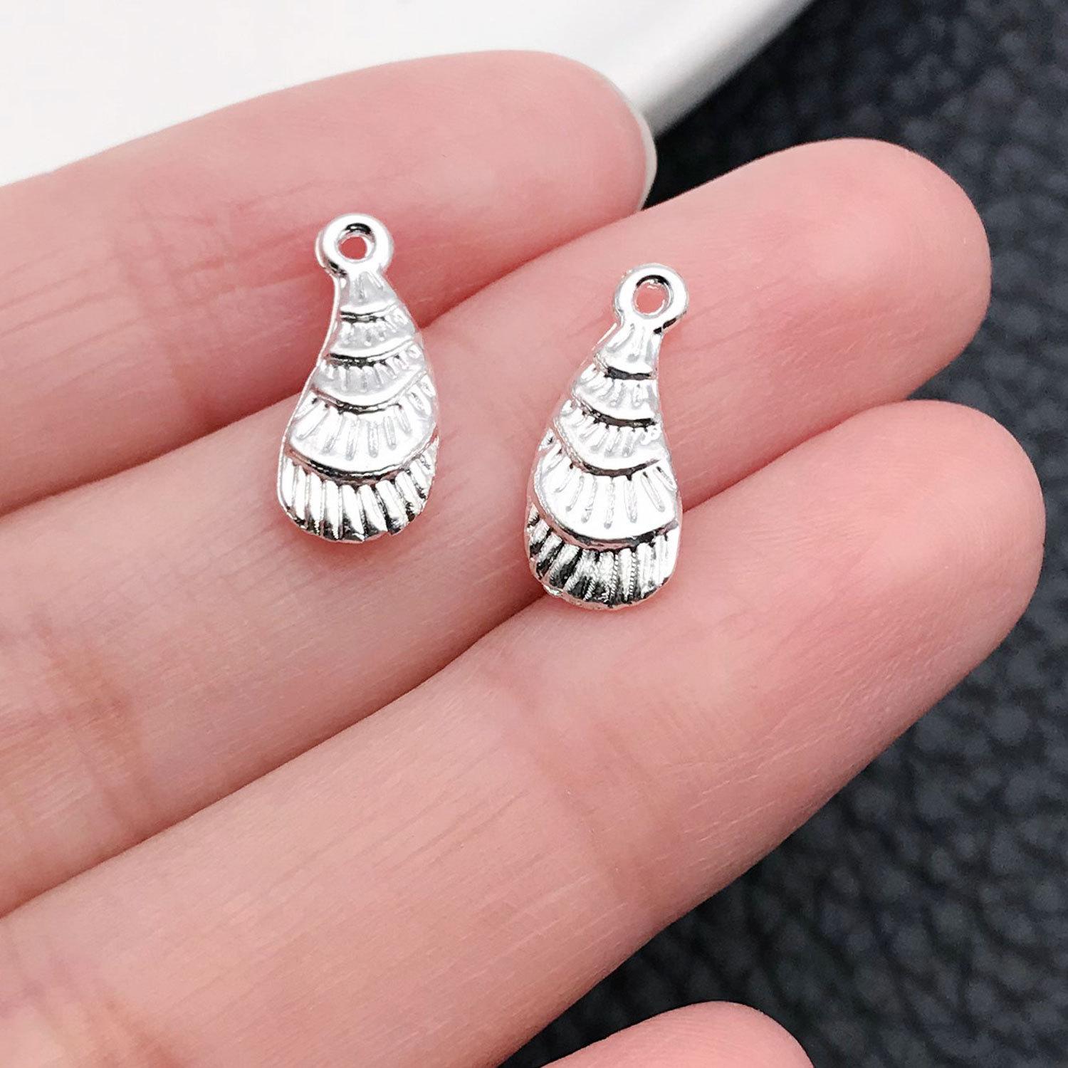 20703-M-亮银锌合金海洋海螺15x6mm-0.6g.j