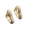 Venta Caliente Transfronteriza Moda Commute Temperamento Aretes Amazon Cobre Incrustado Circonita Lujo Ligero Forma de Corazón Hueco Alto Gama Sensación Aretes