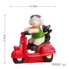 Resina de dibujos animados 3D creativo cachorro conejo lindo motocicleta flor accesorios tiro muñeca adornos de escritorio