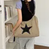 Bolsa tote feminina transversal vintage de outono com estrelas de grande capacidade, versátil para o trabalho, novo modelo 2026, bolsa de ombro moderna