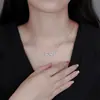 Collar de flor de glicinia de plata pura 999 para mujer, diseño de lujo ligero de alta gama, cadena para la clavícula con colgante de diamantes completos, cadena para el cuello moderna y versátil