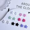 Venta al por mayor Celebridad de Internet colorido Forma barroca amor estrella de cinco puntas joyería para uñas resina decoración de uñas para chica bonita