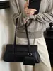 Bolso de axila de alta gama, nicho y sutilmente lujoso para mujer, con un nuevo diseño minimalista con patrón de lichi texturizado, estilo tote y correa para el hombro, perfecto para el día a día.