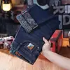 Jeans jacquard para hombre 2026 nuevo modelo, pantalones largos versátiles de pierna recta ajustada elástica para hombre, nuevo producto de primavera y verano