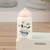 Simulación tridimensional de dibujos animados, botella de leche, pegamento de crema creativo, hecho a mano, DIY, paquete de materiales para accesorios de joyería de resina, venta al por mayor