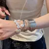 Luz estrellada: Pulsera de estrella y luna con un estilo fresco y minimalista, joyería de lujo ligero y de nicho de alta gama al por mayor