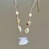 Collar de Perlas con Concha de Estrella de Mar para Mujer Estilo Vacaciones Marinas Cadena Clavicular en Capas Accesorios Únicos Nueva Atmósfera 2025