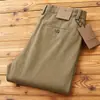 Pantalones largos de sarga versátiles nuevos para Otoño e Invierno, algodón de alta gama, gruesos, cintura recta, elásticos, pantalones casuales para hombre