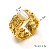 Anillo Retro Europeo y Americano de Acero Inoxidable con Oro de 18K Ahuecado Ojo de Gato para Mujer Ins Nicho de Alta Gama Versátil