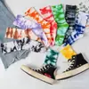 Calcetines tie-dye Suwan Nike St Cuatro Estaciones para hombre y mujer de longitud media cortos de moda calcetines de color caramelo calcetines deportivos de algodón tie-dye