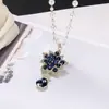 Collar de Perlas de Camelia que Gotea Aceite Nueva Moda para Mujer Exquisita Cadena Larga para Suéter Colgante Versátil de Ropa de Alta Gama