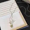 Colar Pingente Gota de Água Pedra Olho de Tigre Feminino 2025 Novo Estilo Quente Design Nicho Luxo Leve Acessórios Corrente Longa para Suéter