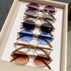Gafas de sol nuevas 2025, montura ovalada retro de madera veteada, gafas de sol europeas y americanas, gafas de moda a prueba de rayos UV, gafas de comercio exterior.