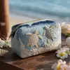 Bolsa de maquillaje acolchada portátil transfronteriza, bolsa multifuncional, impresión digital, venta al por mayor desde el fabricante de origen