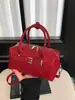 Bolso tipo almohada versátil y elegante transfronterizo para mujer, con un diseño de inspiración coreana, perfecto para el uso diario, ir al trabajo y como un simple bolso cruzado.
