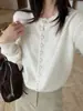 Cárdigan de Lana de Mapache Suave y Cálido de Otoño Han Xun Estilo Nuevo 2026 Suéter Suave de Cuello Redondo Abotonado 27486