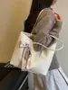 Bolsa de mano grande de patrón tejido vintage al por mayor, bolso de hombro casual versátil para el día a día, bolso de axila moderno y a la moda