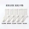 Calcetines blancos para mujer de media pantorrilla primavera y otoño venta caliente calcetines de algodón encaje combinación jk zapatos de cuero pequeños forma de corazón hueco calcetines de maternidad calcetines holgados
