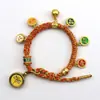 Pulsera tejida a mano estilo Tíbet con Cinco Deidades de la Riqueza, Pulsera Thangka, Colgante Ojo del Dharma del Dios de la Riqueza, Pulsera de Hilo Rojo con Cascabel