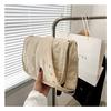 Chaqueta acolchada de algodón bolsa pequeña 2023 otoño nuevo bordado a cuadros bolsa para axila chaqueta de plumón simple color liso retro bolso de hombro