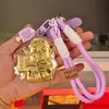 Ouro 999 puro, um amuleto da sorte para riqueza e prosperidade, um pingente dourado para telefones, bolsas e chaves, perfeito como item promocional para lojas e como presente festivo